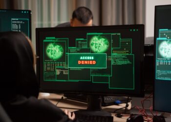 Back view of female hacker get access denied