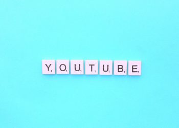 YouTube scrabble letters word on a light blue background
